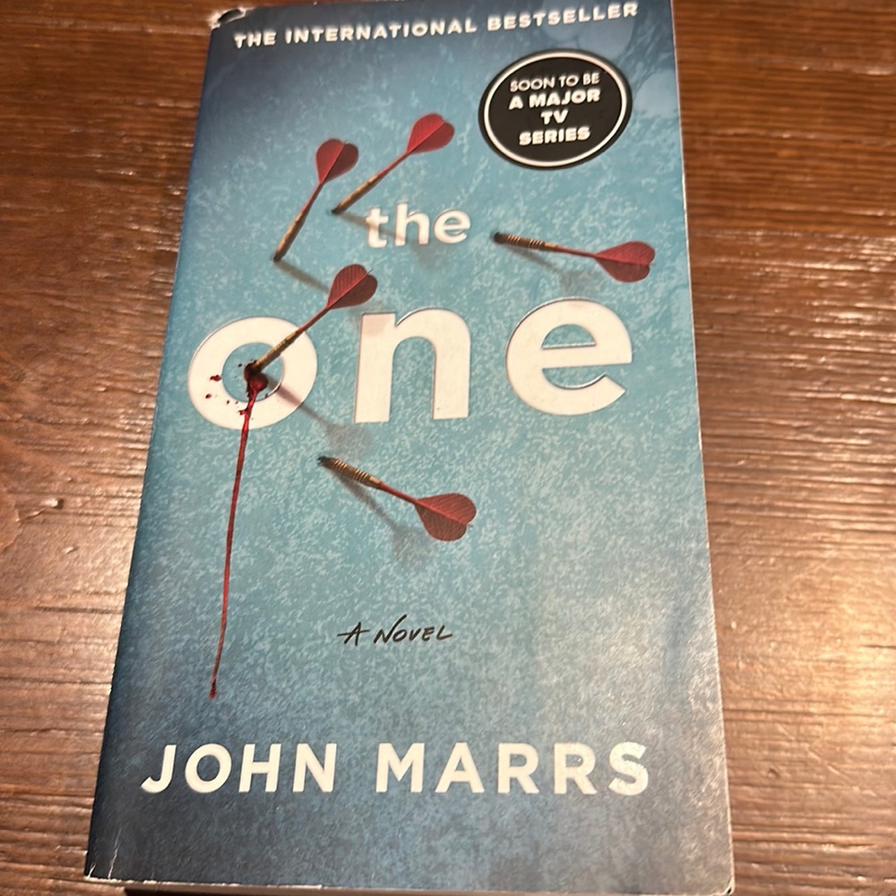 The One paperback book by John Marrs